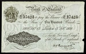A £100 note from 1938 which would have a purchasing power of around £6,500 at today's prices. This one is signed by Major Sir Kenneth Oswald Peppiatt KBE, MC and Bar who was Chief Cashier of the Bank of England from 1934 to 1949. He went on to become a director of Coutts and Co. All notes above £5 were withdrawn in 1943 (although notes of £1,000 and more were still used internally at the Bank of England to register transfers from Scottish and Northern Irish issuing banks). It was 1964 before values higher than £5 were re-introduced.